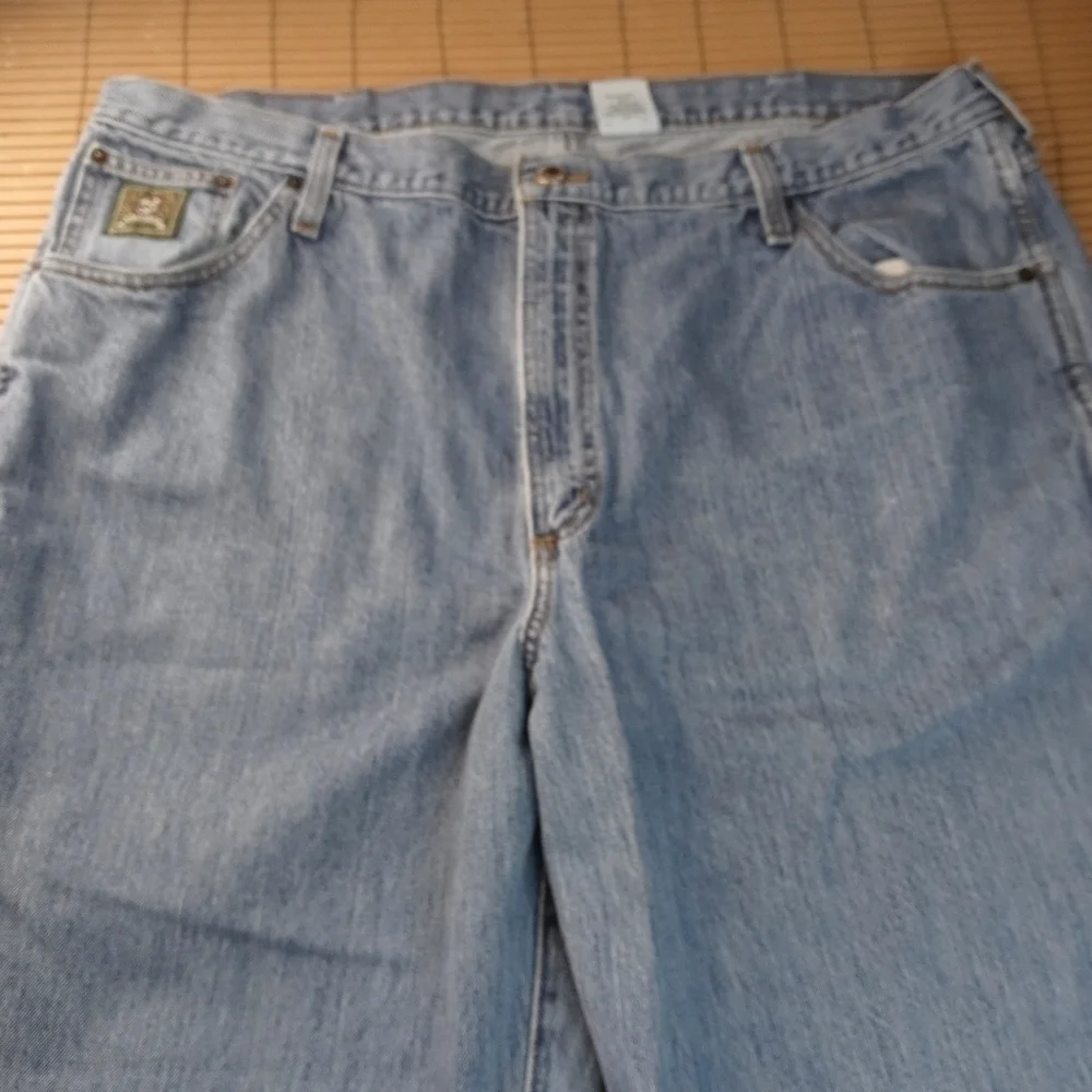Cinch green lable men's blue jeans. Tag sz 42x32. Actual 42x27. 404pm 2